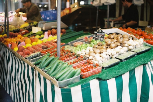 Close-up of fresh fruits and vegetables on a market stall.