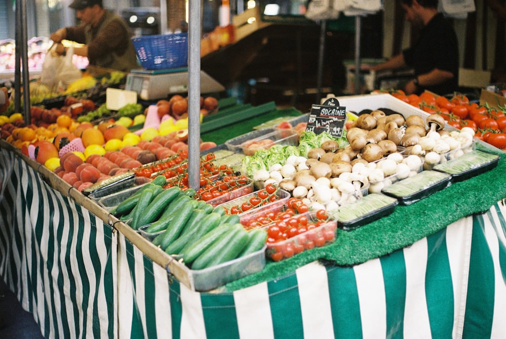 fruits on green plastic trays