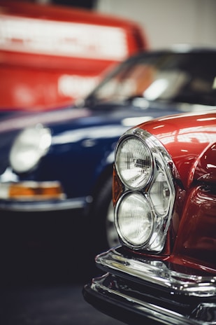 red and silver car in tilt shift lens