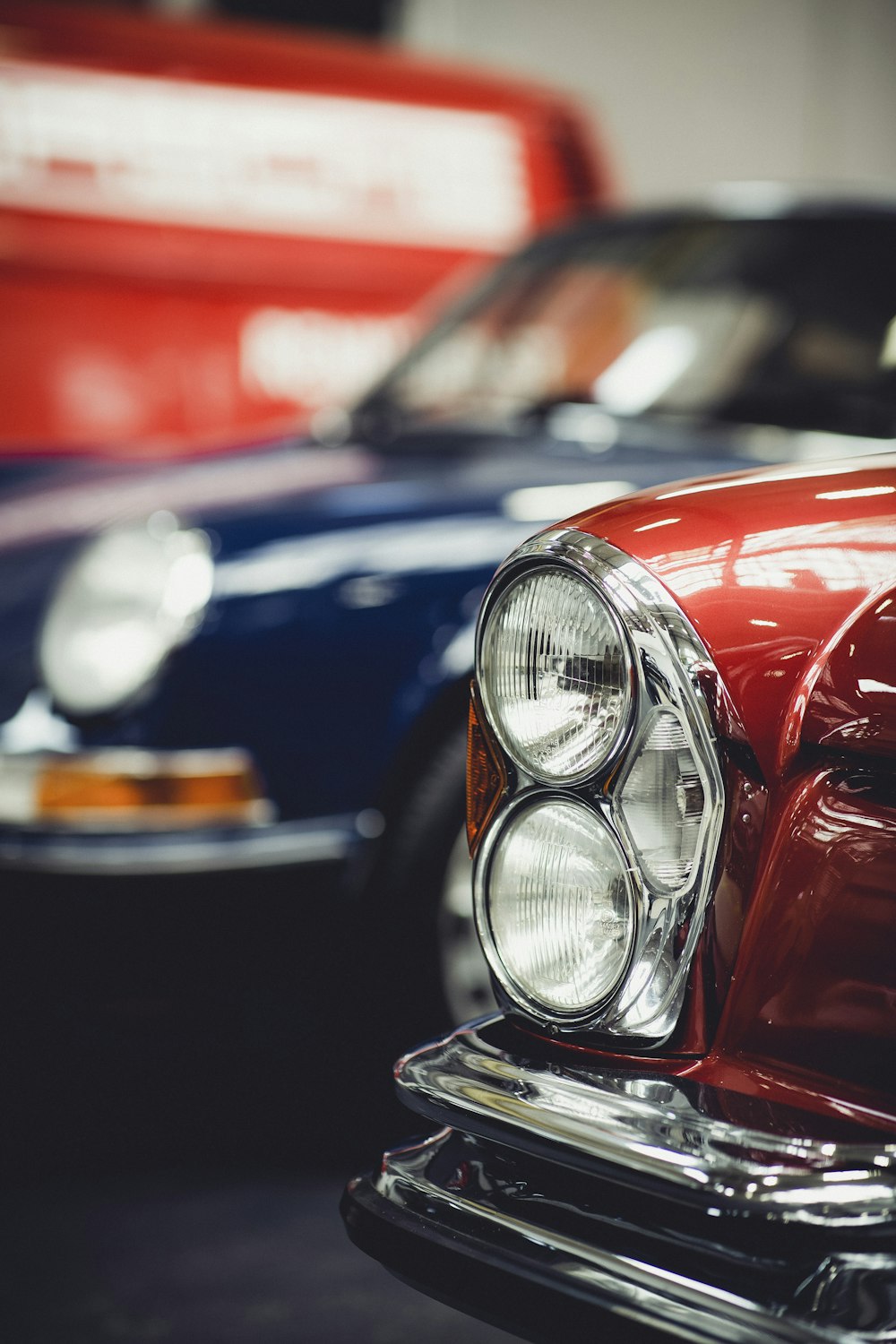 red and silver car in tilt shift lens