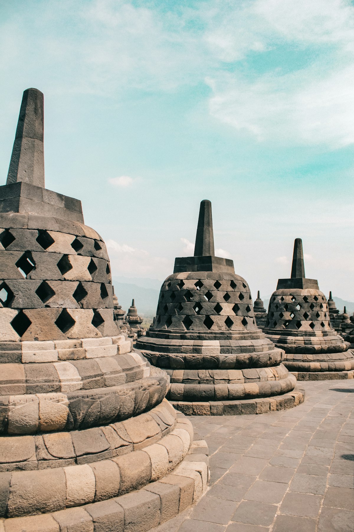 Yogyakarta May — Borobudur temple at sunrise with golden light on stupas