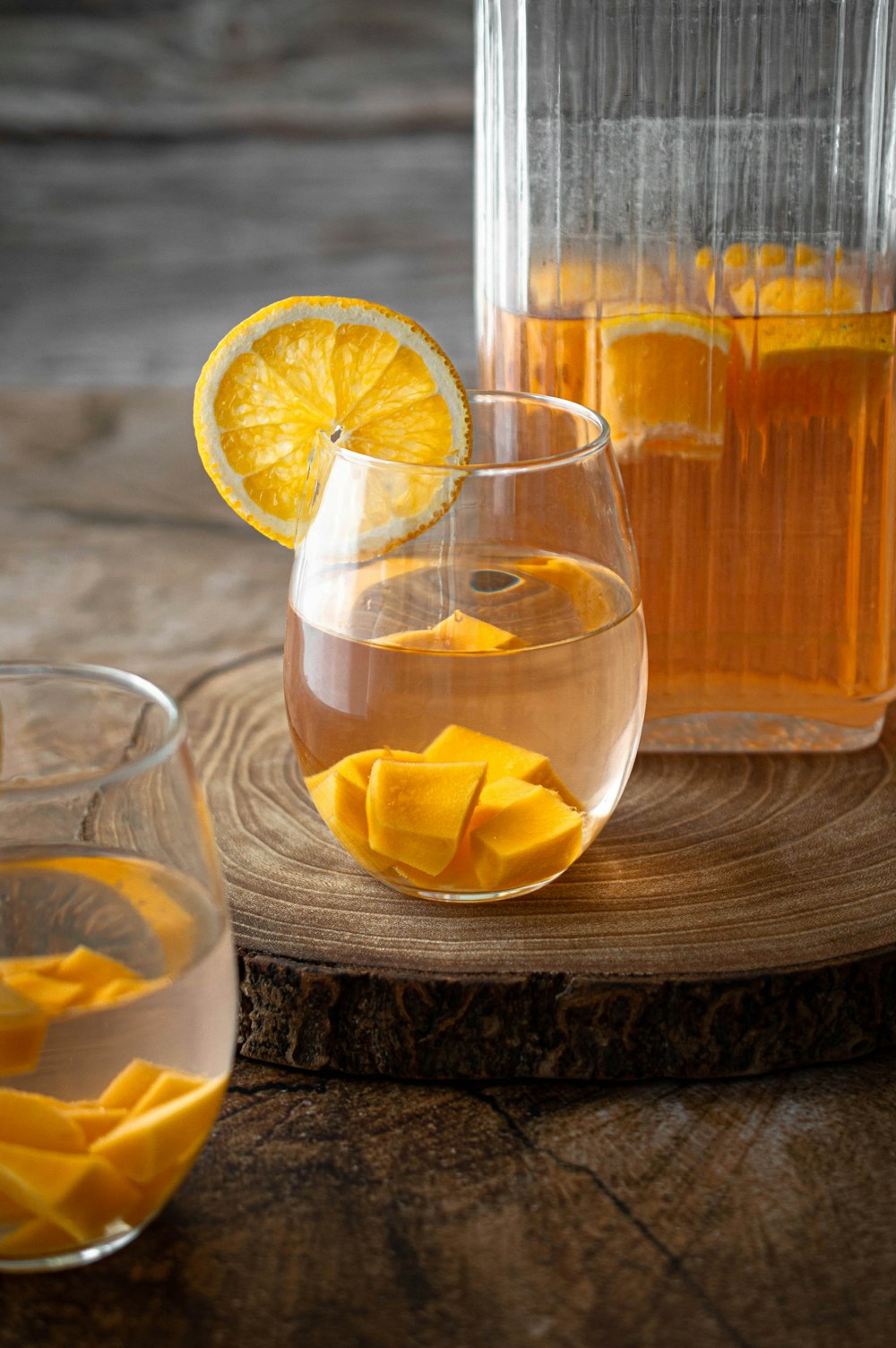 clear drinking glass with orange juice