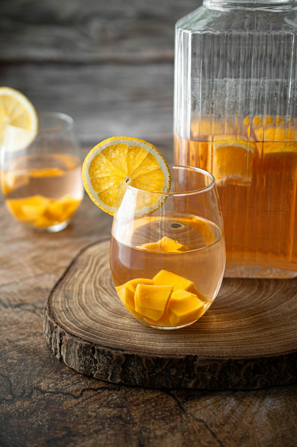 clear drinking glass with orange juice