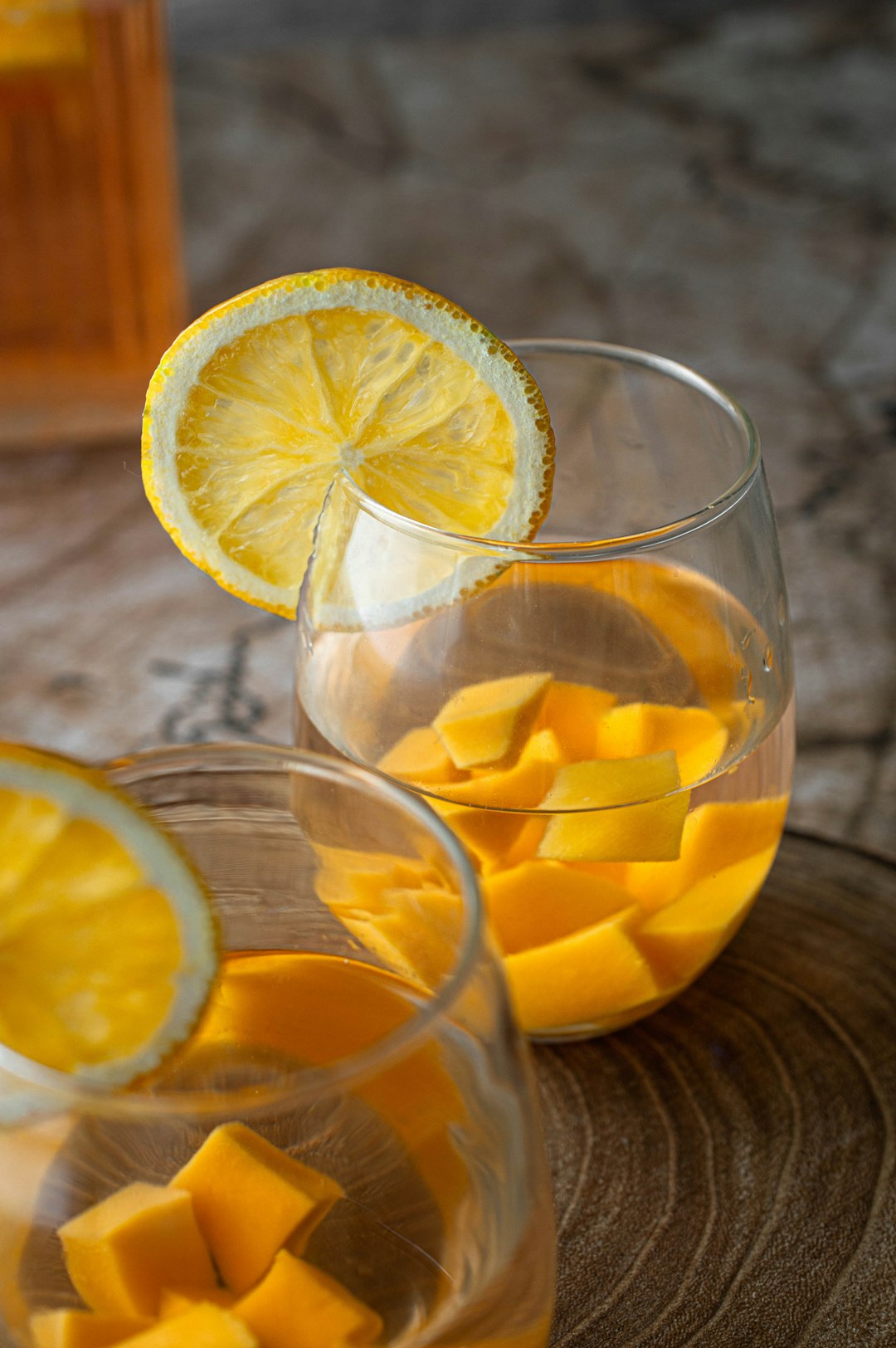 clear drinking glass with sliced lemon