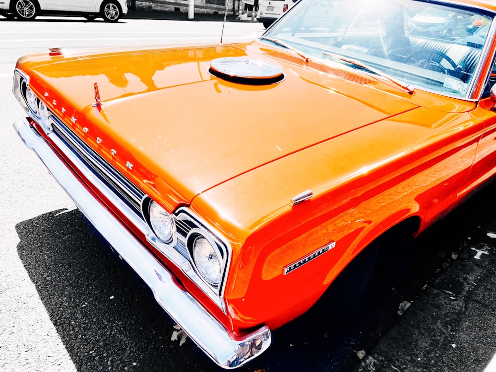 orange and white chevrolet car