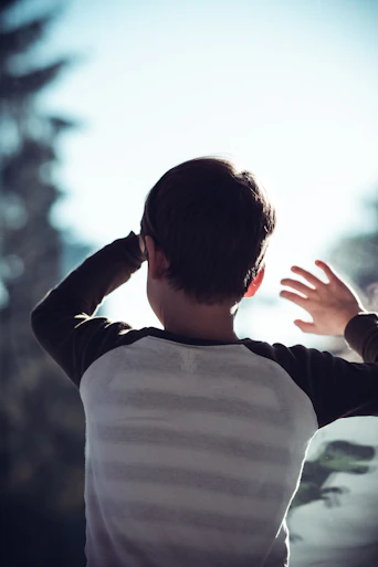 man in white and gray sweater