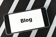 A mobile phone displaying blog images clearly.