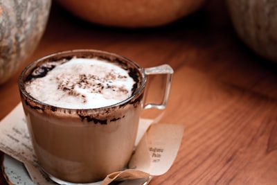 brown ceramic mug with coffee hot chocolate google meet background