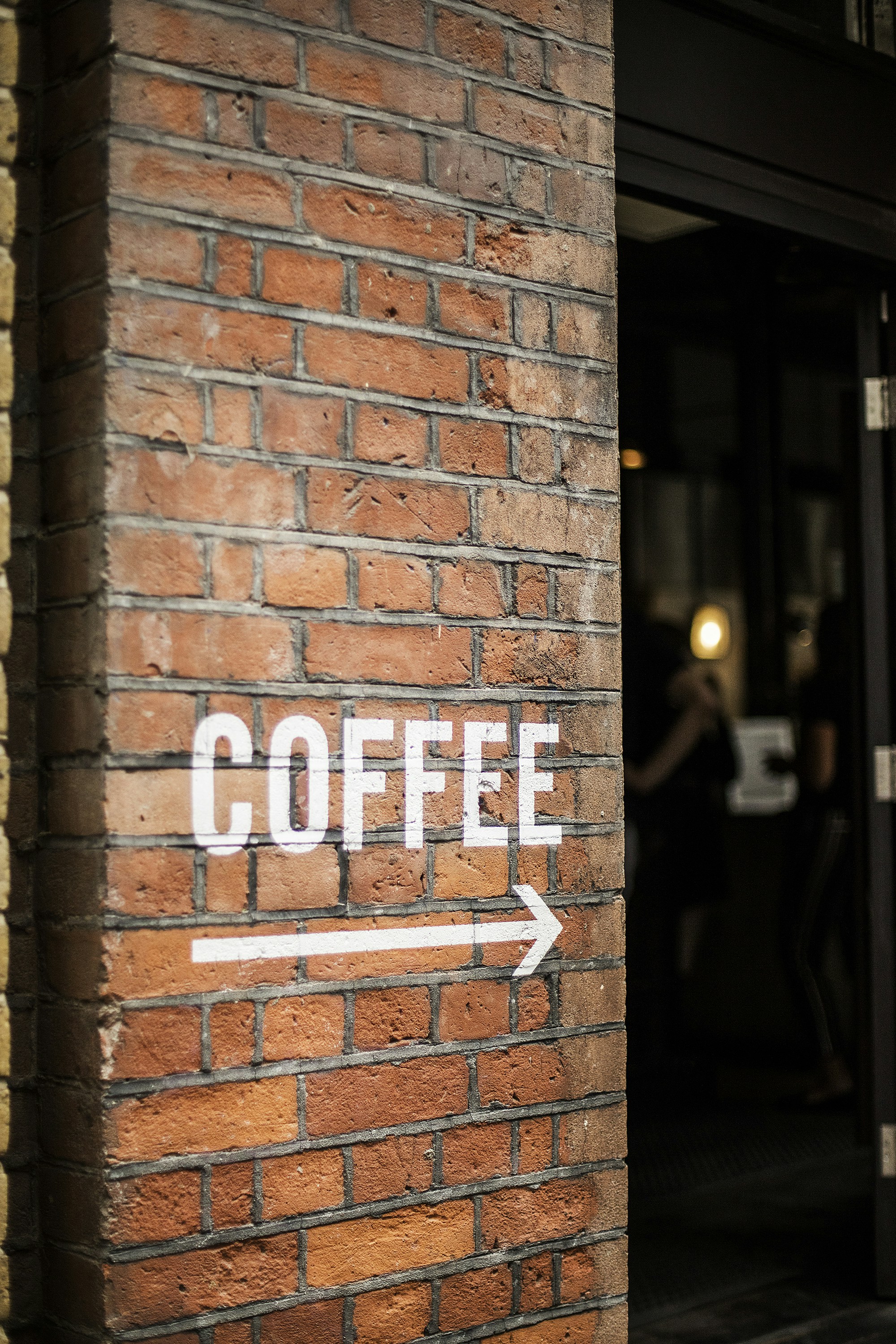 brown brick wall with white light