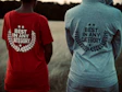 man in red and white crew neck t-shirt