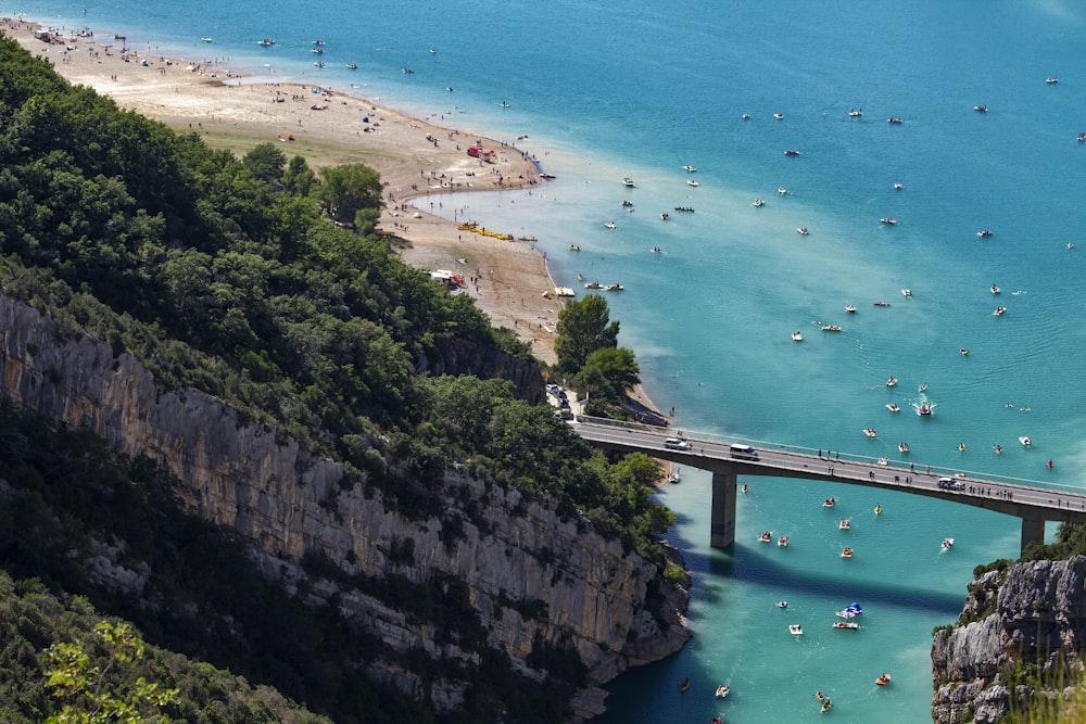 aerial view of white boat on sea shore during daytime