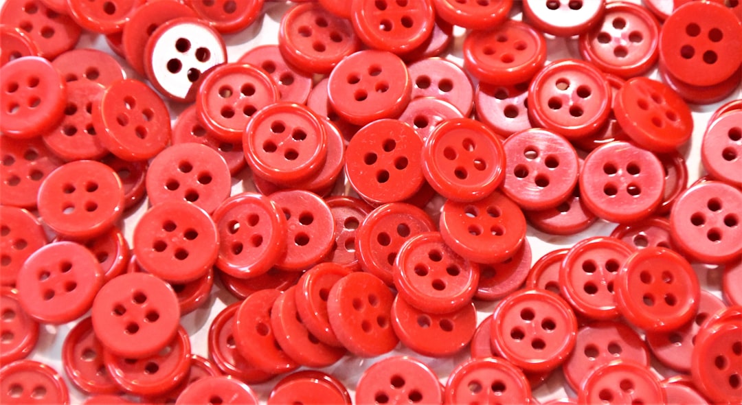  red and white plastic beads button