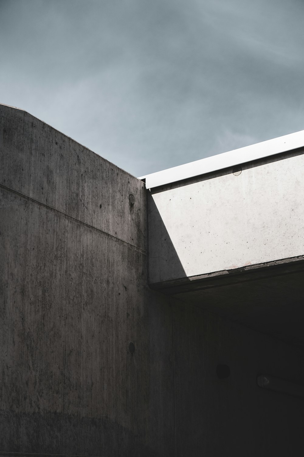 white concrete building under blue sky during daytime