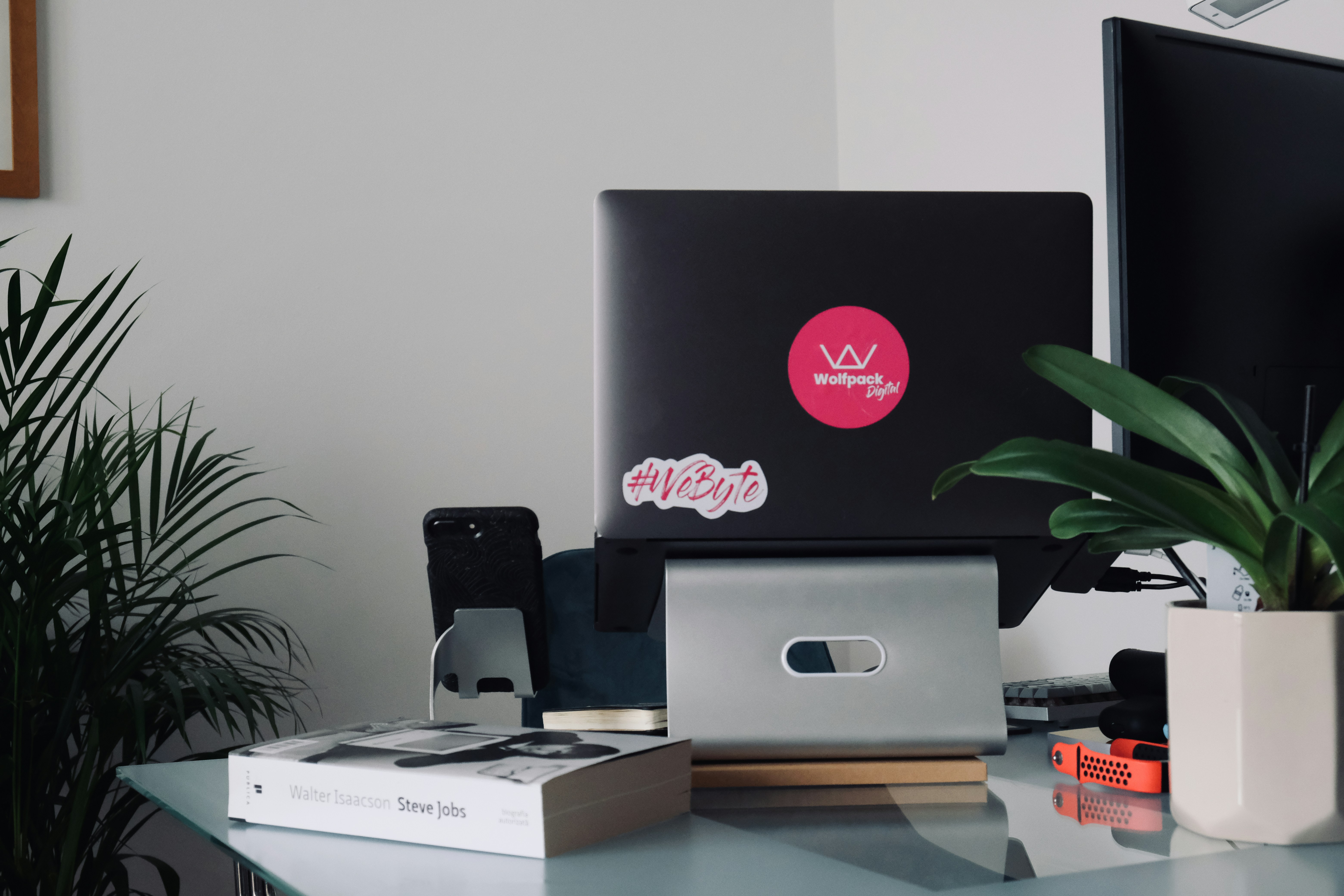 silver imac on brown wooden table