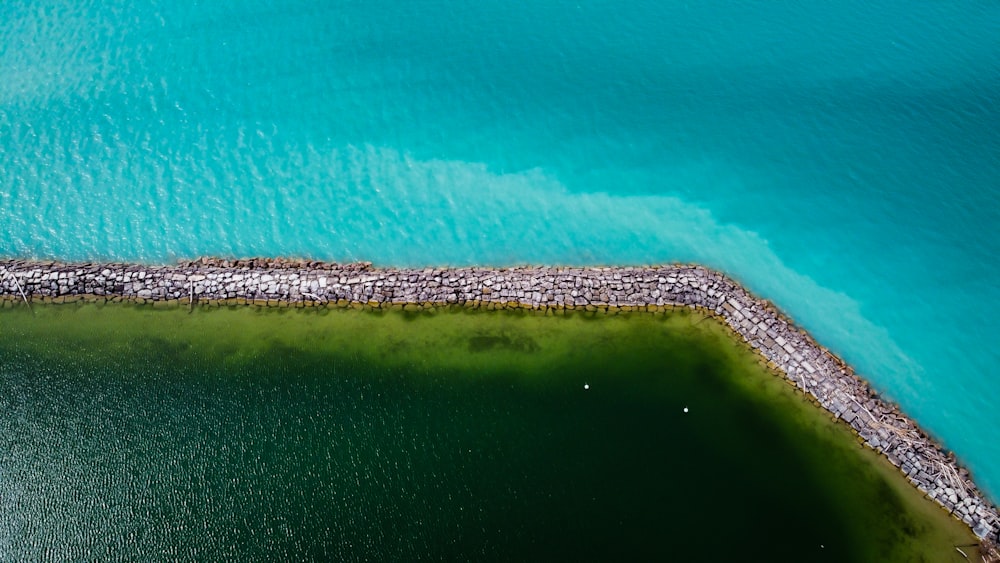 aerial view of island in the middle of ocean