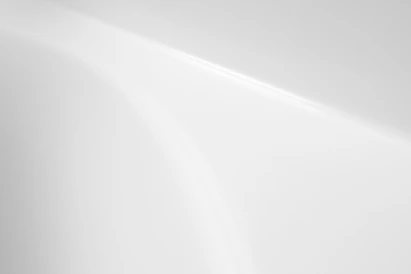 a black and white photo of a white wall