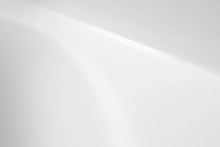 a black and white photo of a white wall