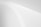 a black and white photo of a white wall