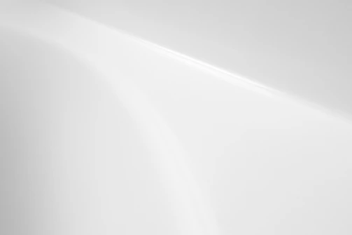 a black and white photo of a white wall