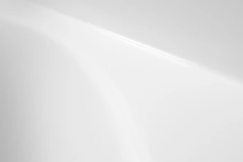 a black and white photo of a white wall