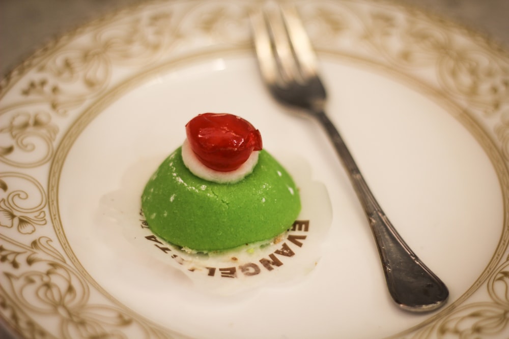 green and white cake on white ceramic plate