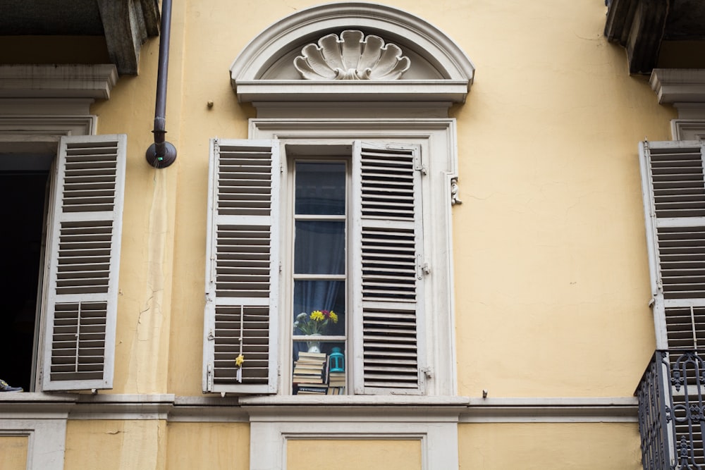 white wooden framed glass window