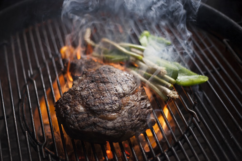 grilled meat on charcoal grill