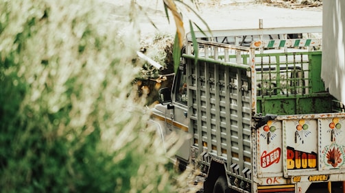 A vibrant vehicle wrapped in colorful branding, showcasing our expert vehicle branding skills.