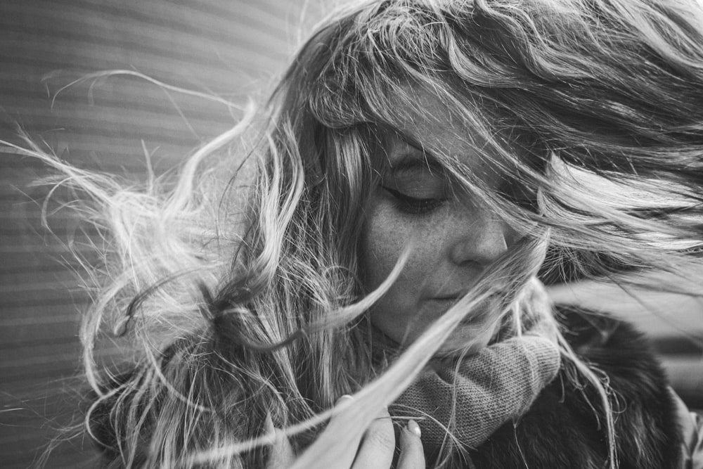 grayscale photo of woman with long hair