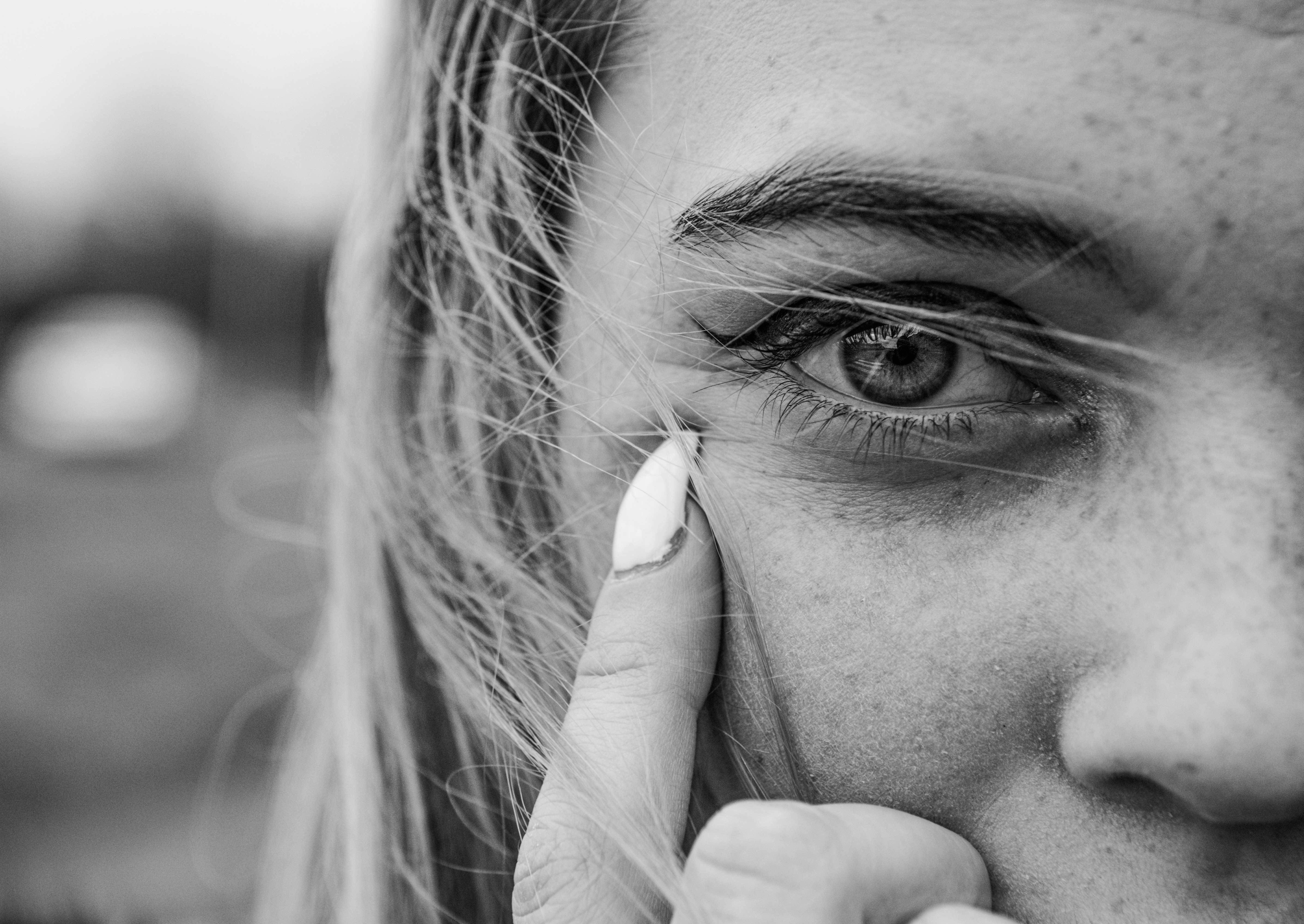 grayscale photo of womans face