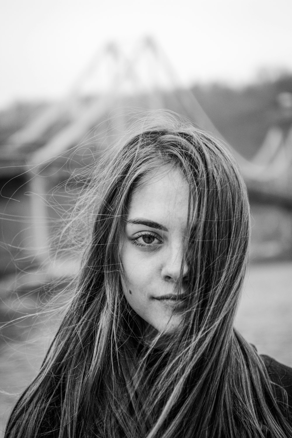 grayscale photo of woman in black shirt