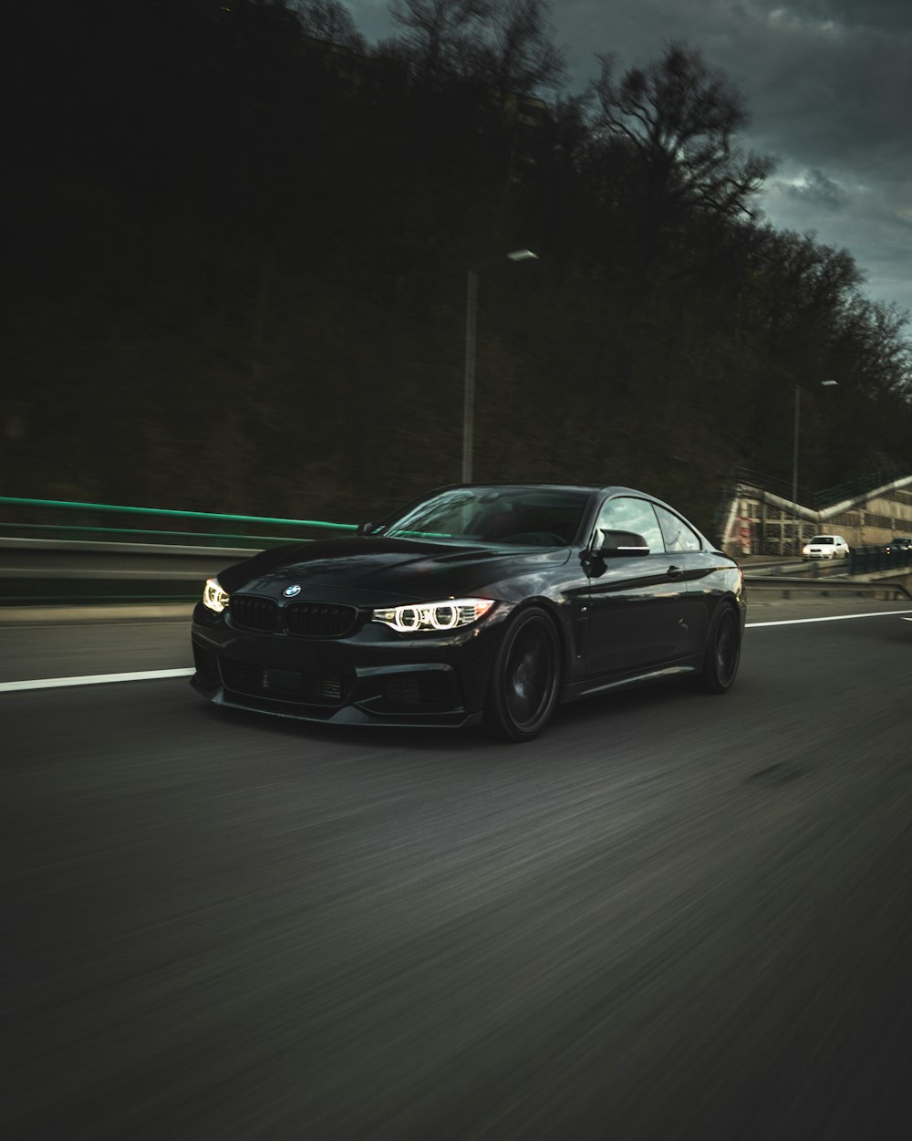 black mercedes benz coupe on road during night time