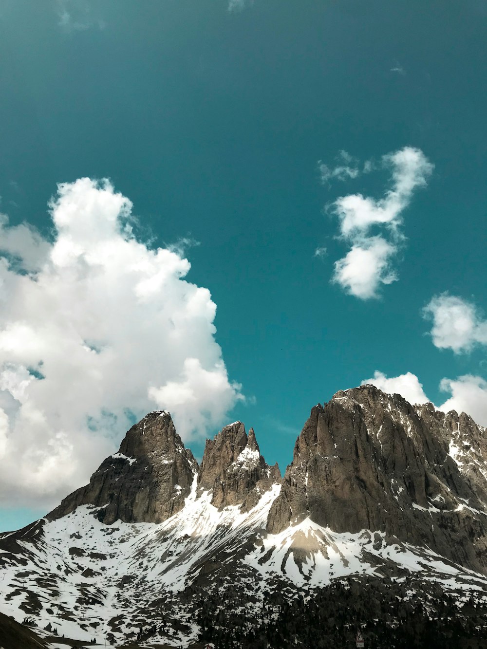 snow covered mountain under blue sky during daytime