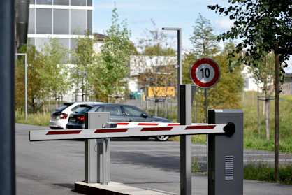 white and red sedan on road during daytime