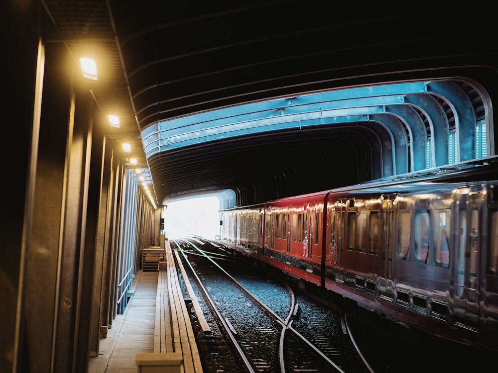 red and white train in train station