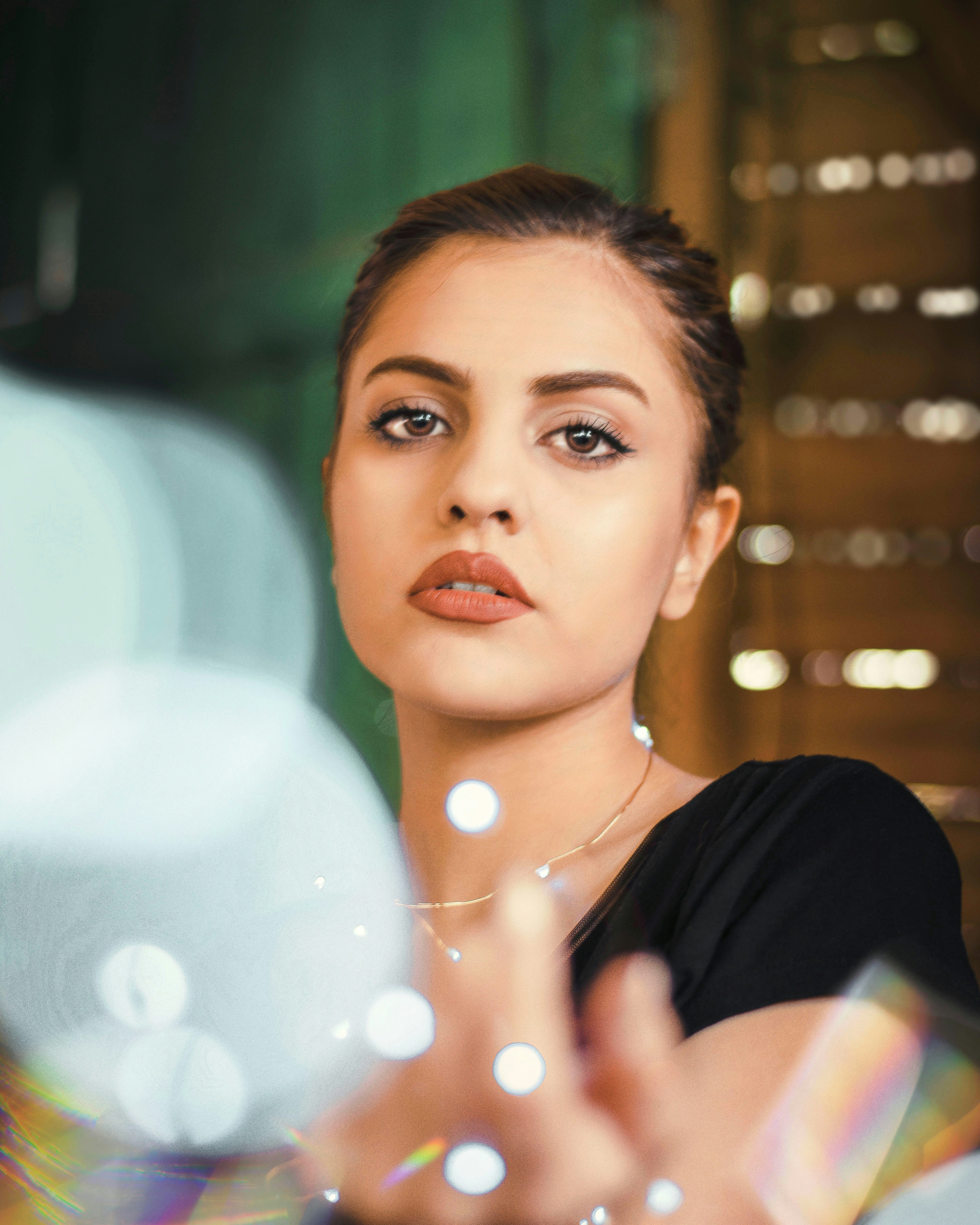 woman in black shirt with red lipstick