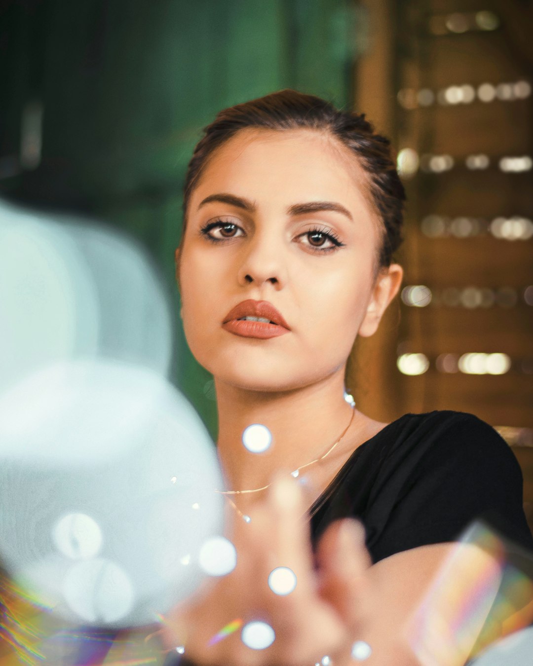 woman in black shirt with red lipstick