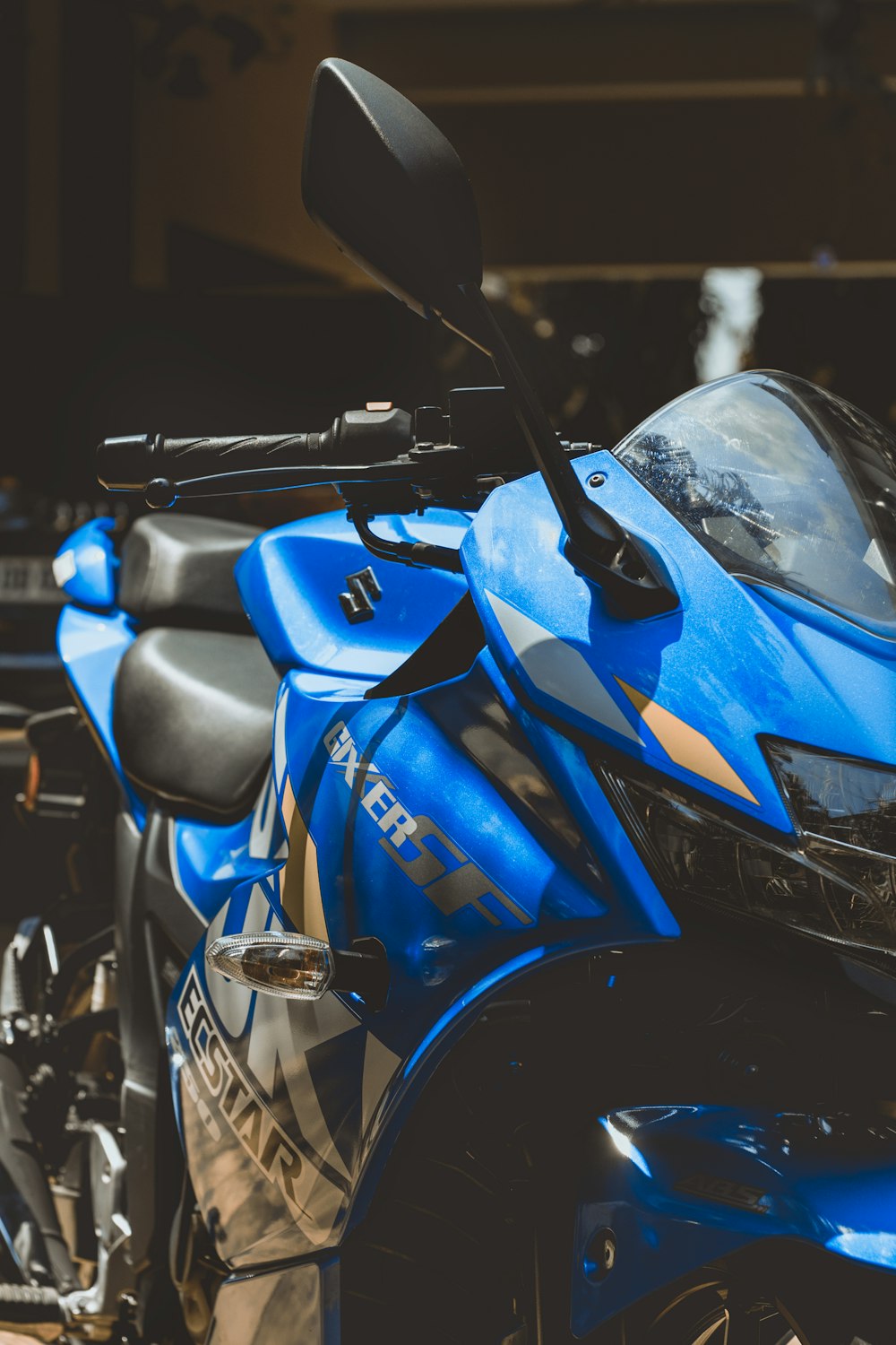 orange and black sports bike