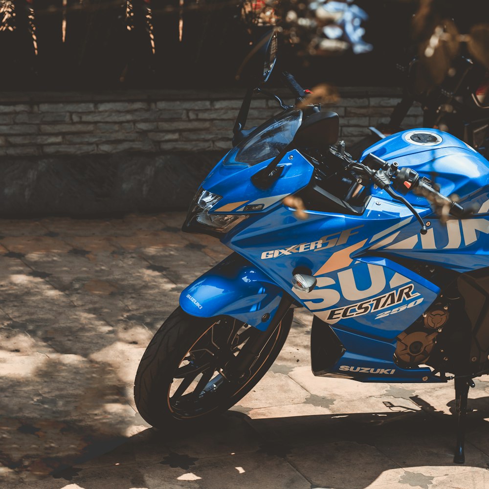 blue and black sports bike