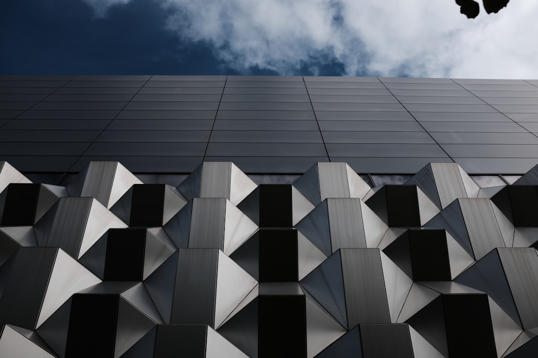 gray concrete building under blue sky during daytime