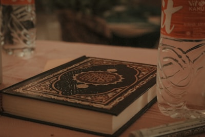 A beautifully arranged table with personal development books and materials.