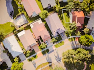 aerial view of green trees and brown concrete building
