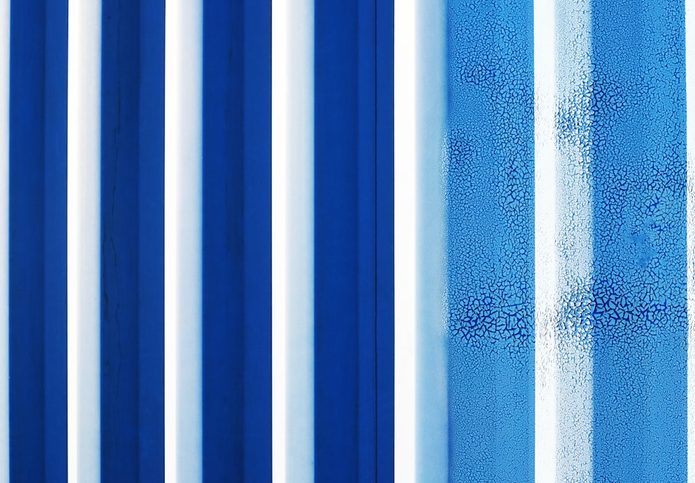 white and blue striped textile