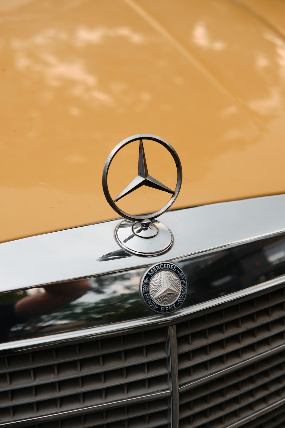 orange and white car with silver and black steering wheel