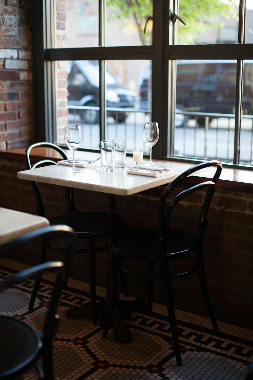 brown wooden table with chairs