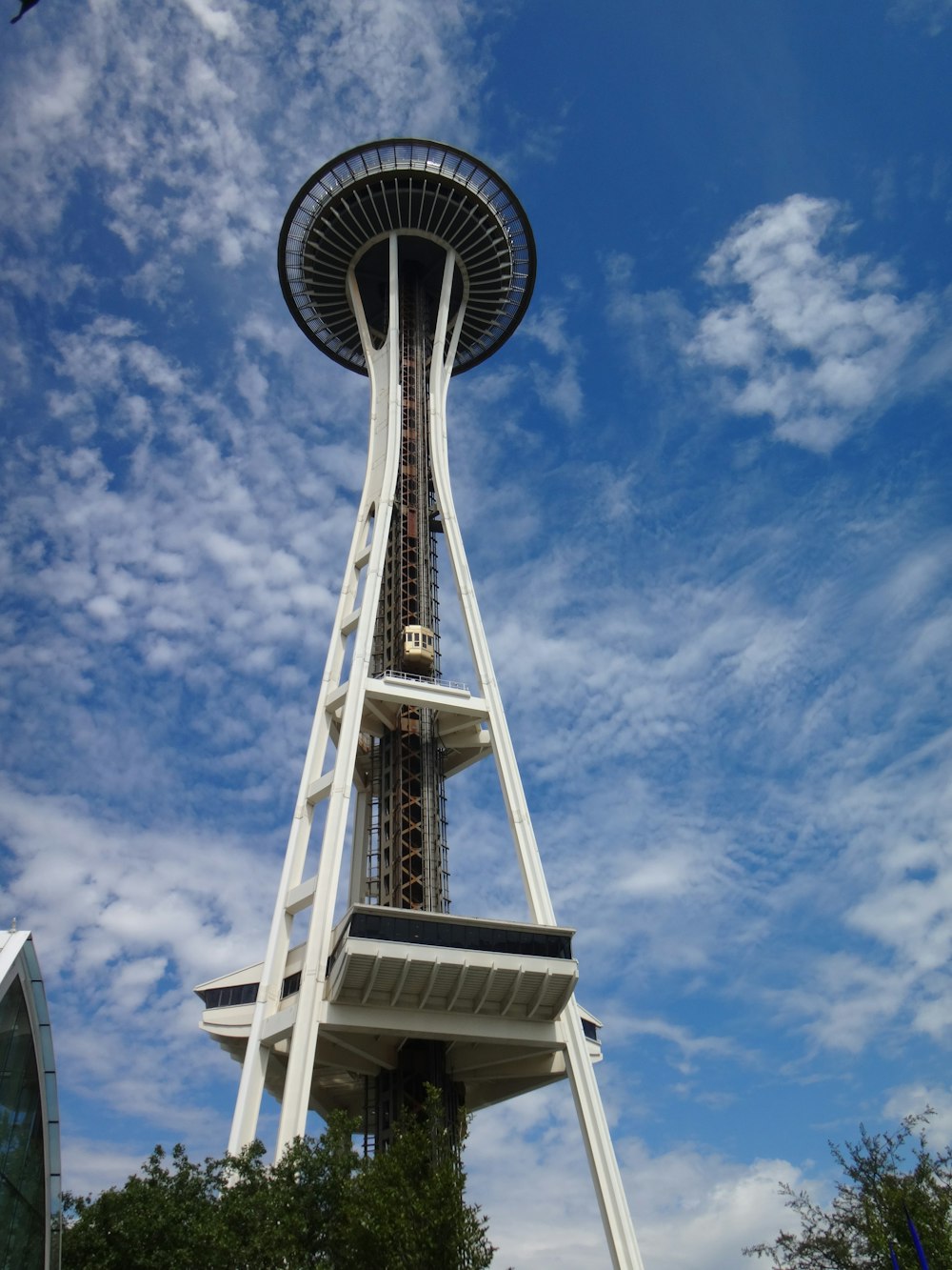 white and blue tower under blue sky