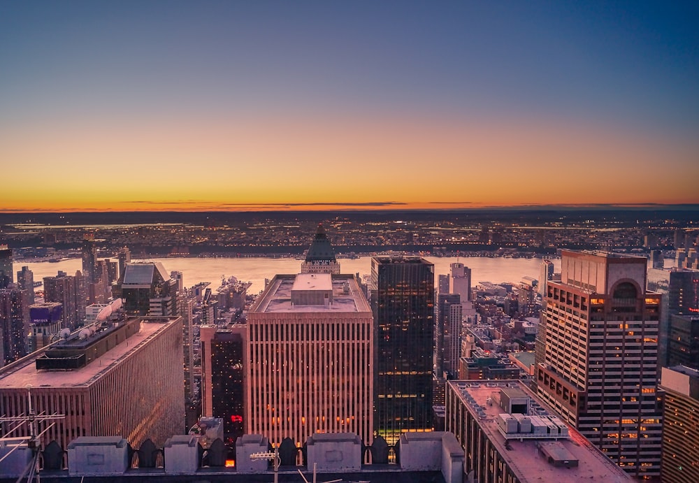 aerial view of city buildings during sunset