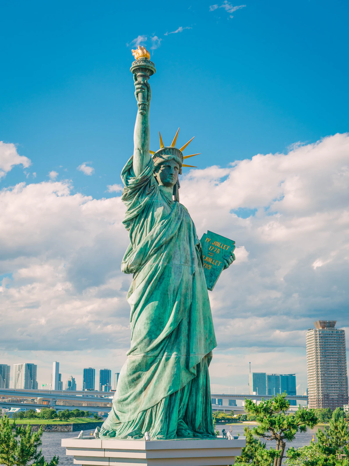 Statue of Liberty against a blue sky