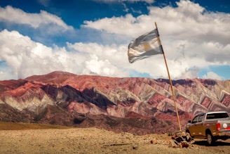 brown rocky mountain under blue sky during daytime