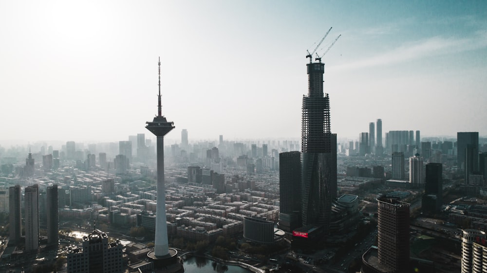 black tower in the city during daytime